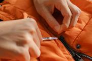 repairing-zipper-puffer-jacket_envato