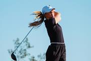 woman golfer on pitch