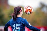 Girl plays football