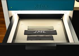 Vizoo's xTex scanner scanning material from JML