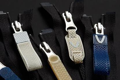 cover YKK’s 3D Composite Puller Wins the Red Dot Award