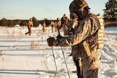 A NATO soldier getting ready to start an exercise in Latvia Feb 2020